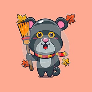 Cute autumn panther holding broom.