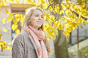 Cute autumn young woman outdoors. Romantic girl in fall park