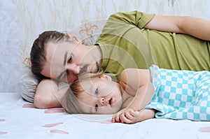 Cute baby ailing with daddy