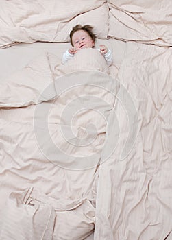 Cute baby in bed