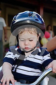 Cute Baby with bicycle helmet