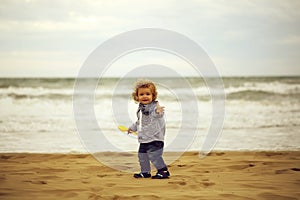 Cute baby boy on beach