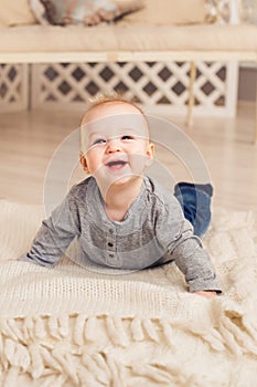 Cute baby boy laughing