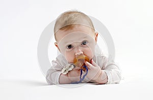Cute baby boy with pacifier