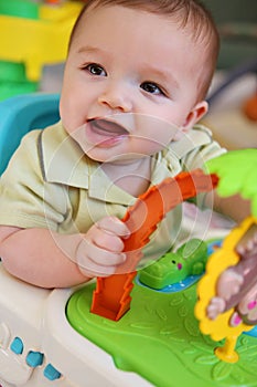 Cute Baby Boy with Toys