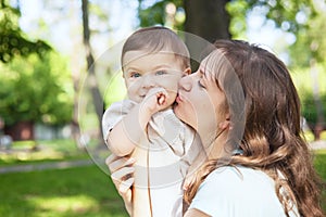 Cute baby boy less 1 year with his mom