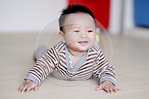 Cute Baby crawling on livingroom floor