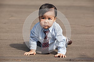 Cute Baby Crawling On The Pier