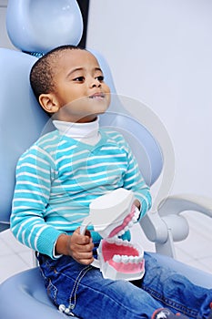 Cute baby in the dental chair