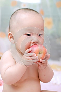 Cute baby eat apple