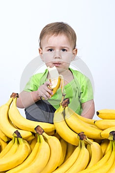 Cute baby eating banana