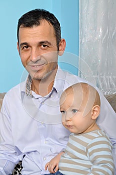 Cute baby and father