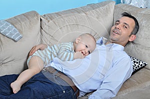 Cute baby and father