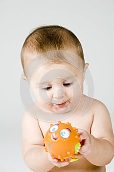 Cute Baby with Fish Toy