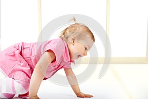 Cute baby girl crawling