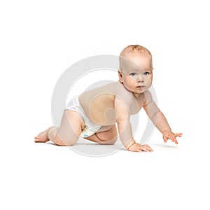 Cute baby girl crawling over white