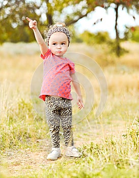 Cute baby girl outdoors