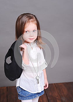 Cute baby girl posing in studio
