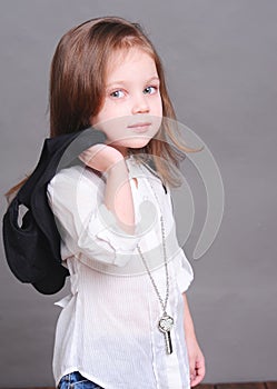 Cute baby girl posing in studio