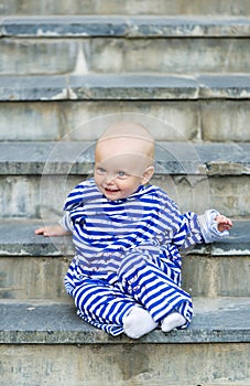 Cute baby girl in sailor suit.