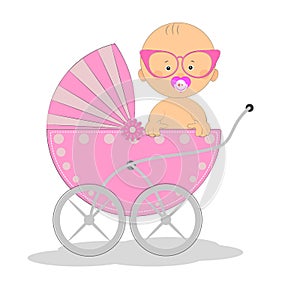 Cute Baby girl is sitting on a carriage