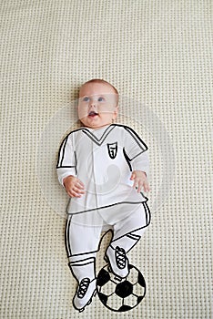 Cute baby girl sketched as footballer