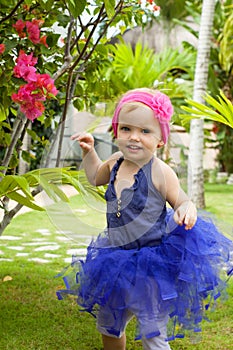 Cute baby-girl in tutu skirt