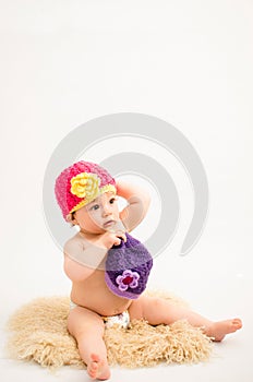 Cute baby girl wearing a hat