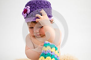 Cute baby girl wearing a hat