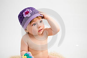 Cute baby girl wearing a hat