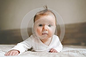 Cute baby infant crawling in bedroom adorable kid