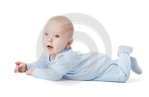 Cute Baby lying on Stomach over White Background in Cotton Babies Bodysuit. Infant four month Child in Blue Onesies Clothes