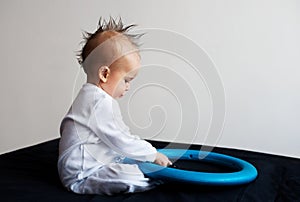 Cute baby with mohawk