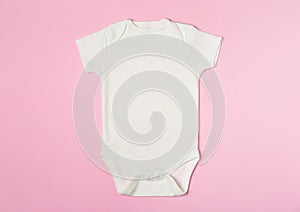 Cute baby onesie on color background