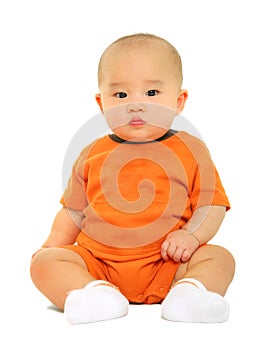 Cute Baby In Orange Shirt Puzzled