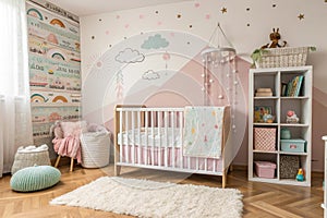 Cute baby room with crib and decor photo