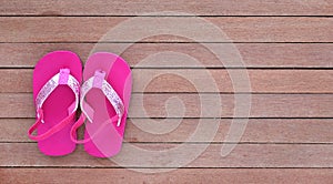 Cute baby sandal shoes on wood plank, Little shoe on wood floor with copy space, Top view