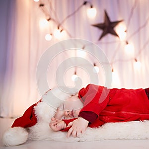 Cute baby santa sleeping
