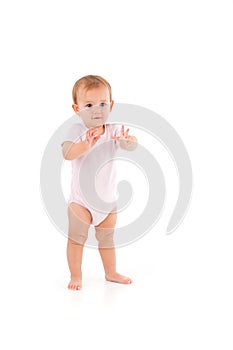 Cute baby standing unstable