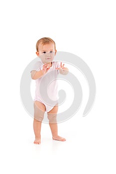 Cute baby standing unstable photo