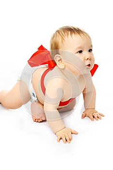 Cute baby tied up with a red ribbon