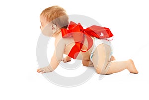 Cute baby tied up with a red ribbon