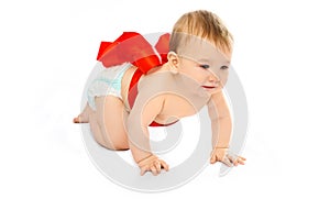 Cute baby tied up with a red ribbon