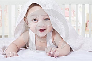 Cute Baby Try to Crawl under A Towel