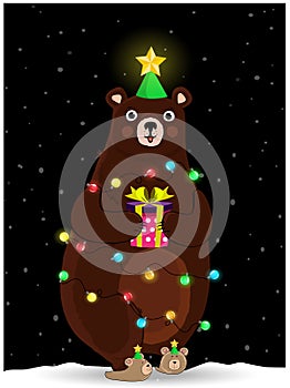 Cute bear in fir tree hat wind round with garland on night snowy background