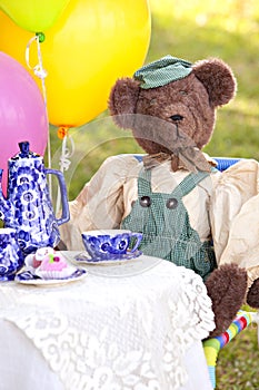 Cute bear at tea party