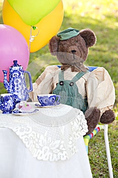 Cute bear at tea party