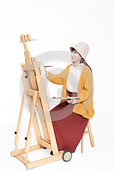 Cute beautiful girl painter