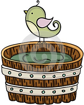 Cute bird with wooden tub for a bath