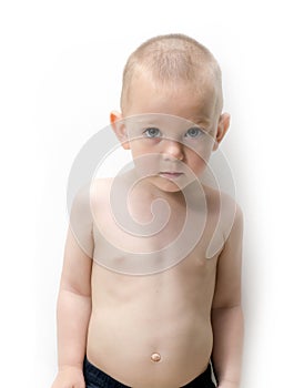 Cute blond blue-eyed baby with a guilty face on a white background